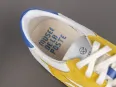Vue 3 – chaussures jaune